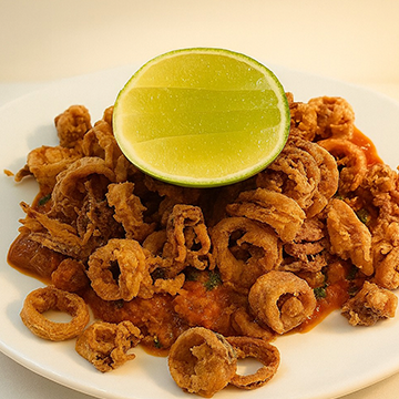 Champiñones rellenos gratinados en Caminito